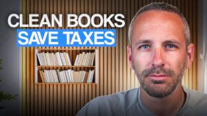 Small business owner reviewing bookkeeping records for tax planning